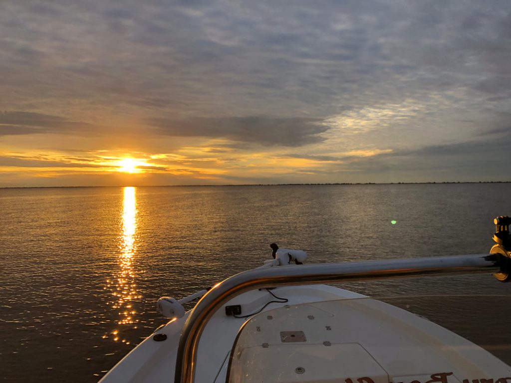 sunset over lake catherine its a great morning for charter fishing